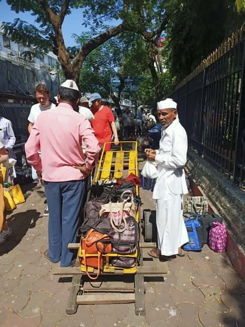 Best Combo Tour: Dabbawalas, Dhobi Ghat and Slum with Train - Riding the local train like you belong to the route