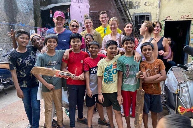 Best of Dharavi Slum with Market Tour - The market tour part: flowers, jewelry stalls, and food lanes