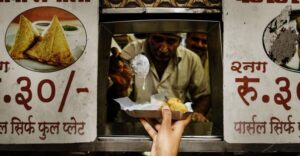 Bombay Express Mumbai Food Tour with 15+ Tastings - Churchgate to the first food wave: chaat snacks and dosa-style comfort
