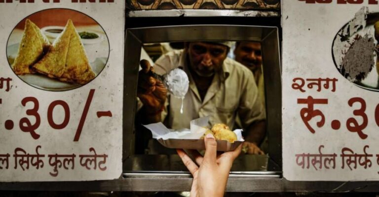 Bombay Express Mumbai Food Tour with 15+ Tastings - Churchgate to the first food wave: chaat snacks and dosa-style comfort