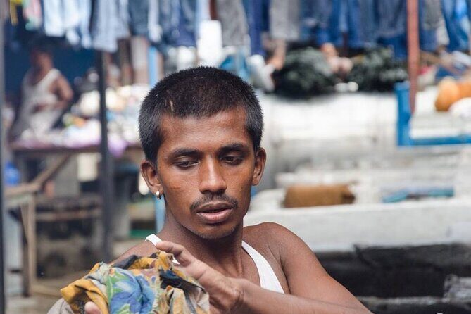 Dhobi Ghat Guided Tour A walk inside the biggest open air Laundry - Charcoal irons and the surprising skill in pressing clothes