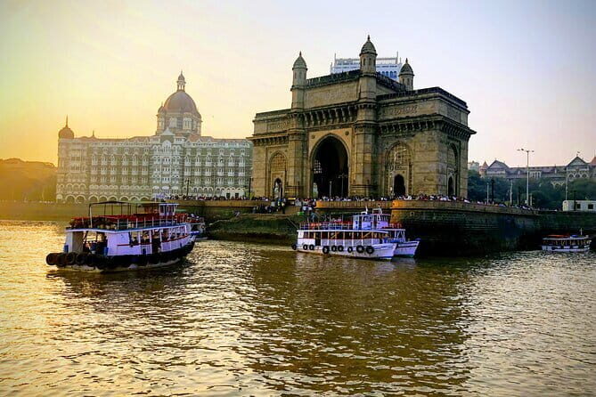 Mumbai City Sightseeing and Elephanta Caves Tour - Malabar Hill to Marine Drive: gardens, the big civic building, and night-style views