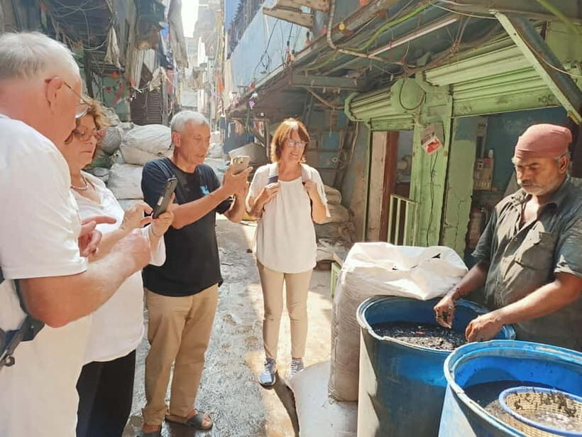 Mumbai: Dharavi Slum and Dhobi Ghat Tour with Train Ride - Hopping on the Mumbai local train ride: how it changes the feel of the day
