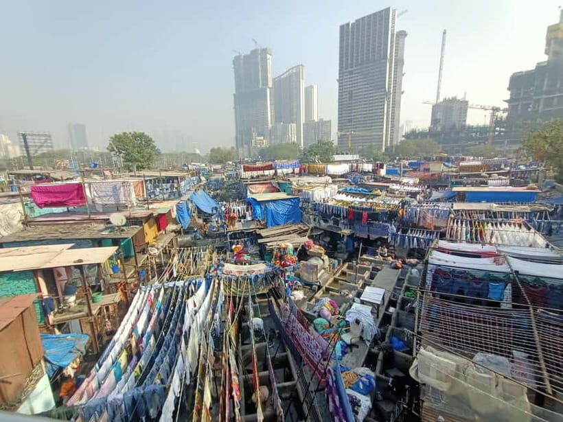 Mumbai: Dharavi Slum and Dhobi Ghat Tour with Train Ride - Price and value at $26 per person: what you get for the money