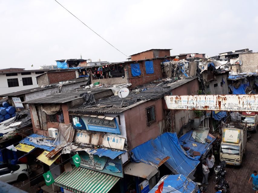 Mumbai: Dharavi Slum Walking Tour with Local Slum Dweller - Optional pottery workshop: making something real on the wheel