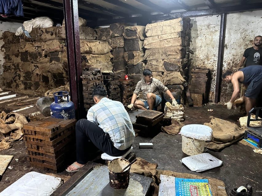 Mumbai: Discover India's Largest Slum -A Local's Perspective - Community projects, bakery sample, and a rooftop finish with perspective