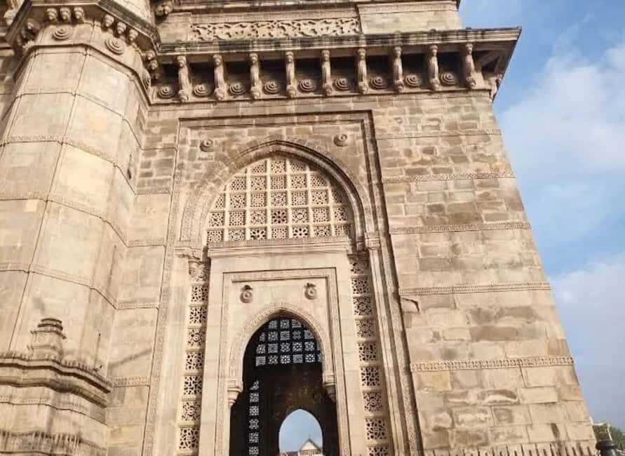Mumbai: Exclusive Full-Day City Tour with Optional Caves - Crawford Market, Marine Drive, and Mani Bhavan: three different Mumbai moods