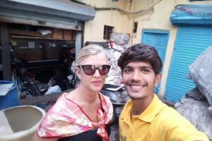 Private Bollywood with Slum Tour Inclusive of Guide and Transport - Getting there in comfort: pickup, AC vehicle, and real time-saving