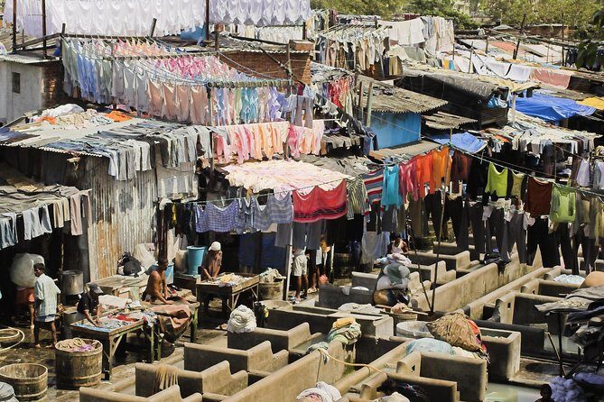 Private Dharavi Slum, Dabbawala & Dhobi Ghat tour with Transport - Churchgate Railway Station and the dabbawala lunch pipeline